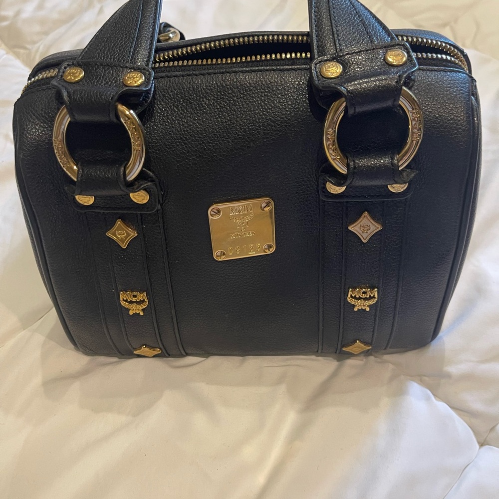 MCM Black Leather Handbag with Gold Accents